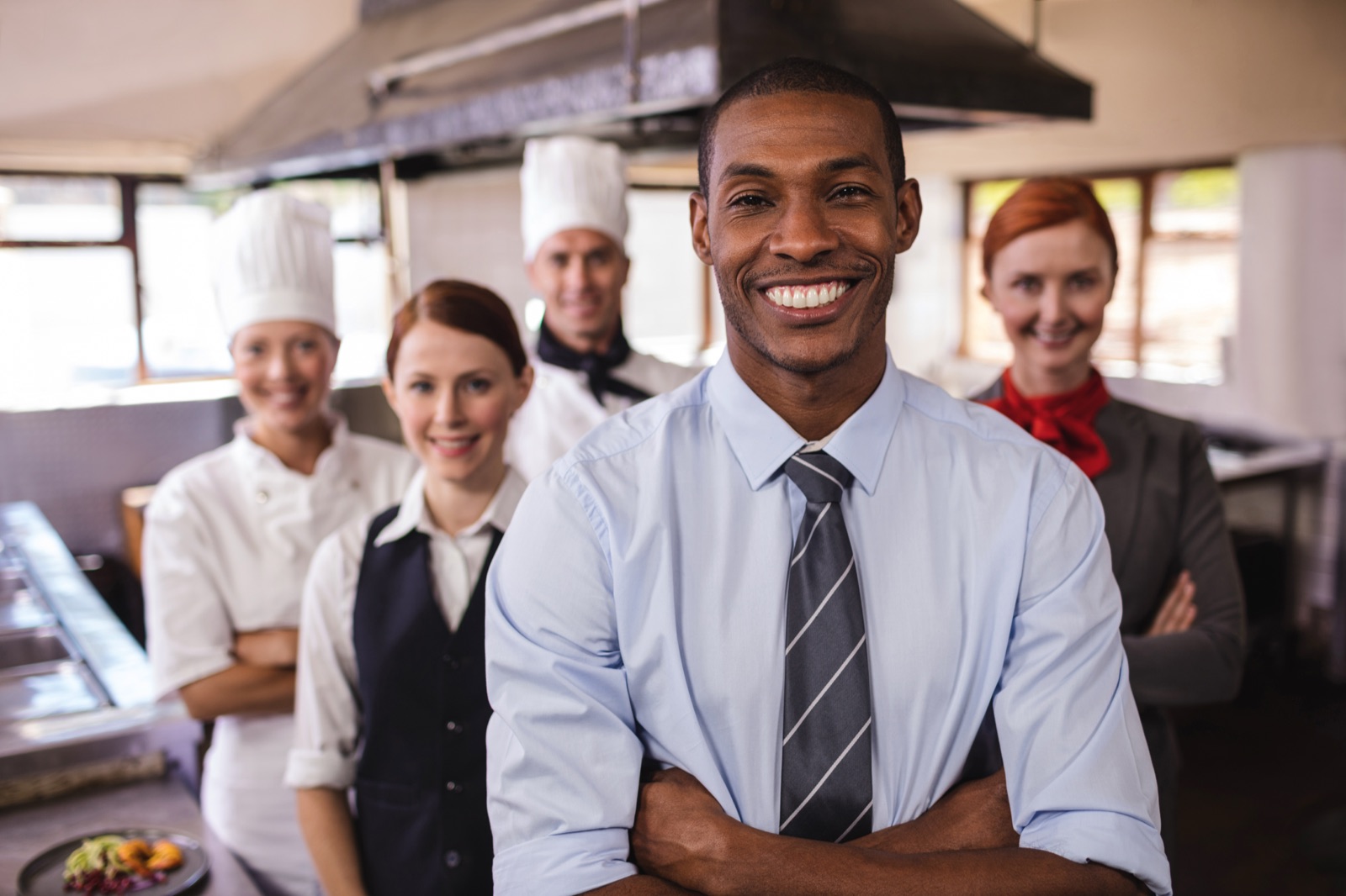 Hospitality team in a commercial kitchen protected by Levy's pest program
