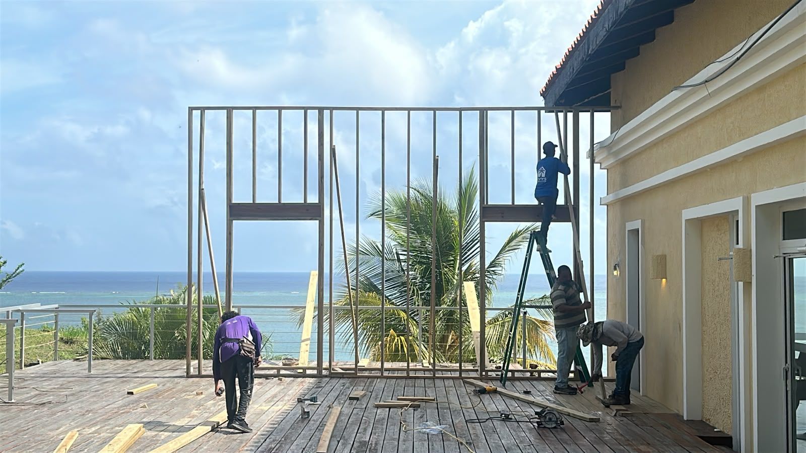 Levy's crew framing an oceanfront addition overlooking the Caribbean